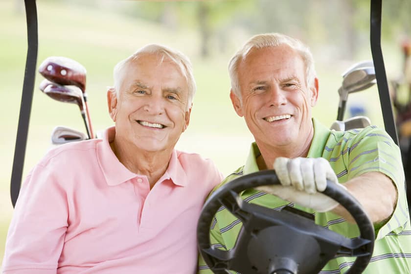 Older men in golf cart
