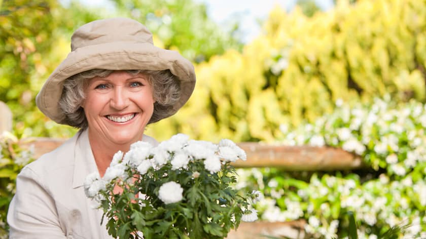 Mature woman with a bouquet of flowers